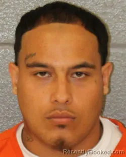Mugshot of Christian Jose Dos Santos booked in Mecklenburg County, North Carolina on August 21, 2026