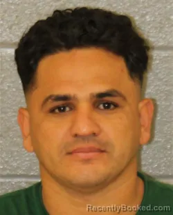 Mugshot of Milton David Diaz booked in Mecklenburg County, North Carolina on August 22, 2026