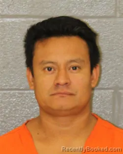 Mugshot of Alejandro Flores Cordova booked in Mecklenburg County, North Carolina on August 23, 2026