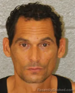 Mugshot of Carlos Xavier Santos-Rodriguez booked in Mecklenburg County, North Carolina on August 24, 2026