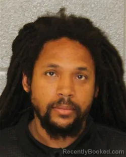 Mugshot of Latonio Demarcus Holmes booked in Mecklenburg County, North Carolina on August 24, 2026