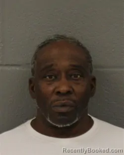 Mugshot of Gregory Andre Chisholm booked in Mecklenburg County, North Carolina on August 26, 2026