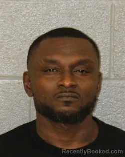Mugshot of Abraham P Dousuah booked in Mecklenburg County, North Carolina on August 27, 2026