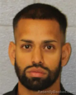 Mugshot of Bhavin Pankaj Patel booked in Mecklenburg County, North Carolina on August 27, 2026