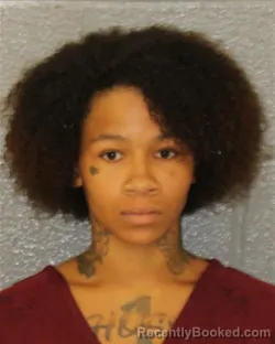 Mugshot of Tiekerra Shania Moore booked in Mecklenburg County, North Carolina on August 28, 2026