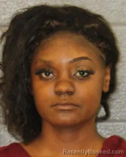 Mugshot of Nidareha Michelle Taylor booked in Mecklenburg County, North Carolina on September 30, 2026