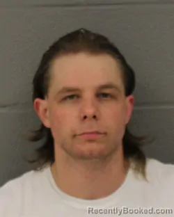Mugshot of Seth Austin Schneck booked in Mecklenburg County, North Carolina on October 2, 2026