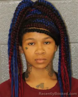 Mugshot of Tiekerra Shania Moore booked in Mecklenburg County, North Carolina on October 2, 2026