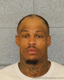 Mugshot of Devron Dominique Spain booked in Mecklenburg County, North Carolina on October 6, 2026