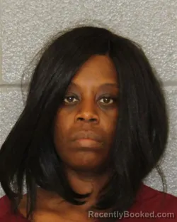 Mugshot of Krystel Harvey booked in Mecklenburg County, North Carolina on October 7, 2026