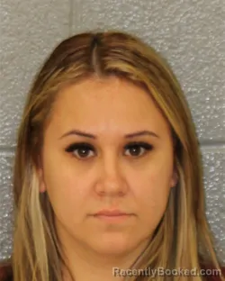 Mugshot of Felecia Flores Juarez booked in Mecklenburg County, North Carolina on October 8, 2026