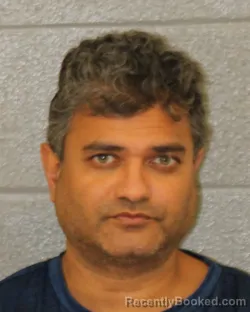 Mugshot of Anup Uttamlal Patel booked in Mecklenburg County, North Carolina on October 9, 2026