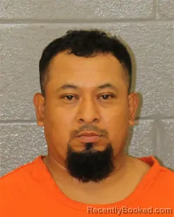 Mugshot of Douglas Quintanilla-Sanas booked in Mecklenburg County, North Carolina on October 10, 2026