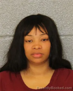 Mugshot of Ayesha Carlisle Klose booked in Mecklenburg County, North Carolina on October 12, 2026