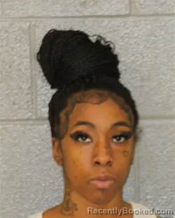 Mugshot of Sinyiah Austin booked in Mecklenburg County, North Carolina on October 12, 2026