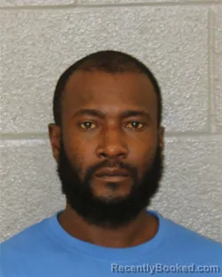 Mugshot of Reginald Earl Johnson booked in Mecklenburg County, North Carolina on October 13, 2026