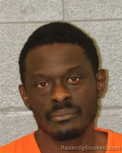 Mugshot of Okuka Eric Elungu-Eluhu booked in Mecklenburg County, North Carolina on October 14, 2026