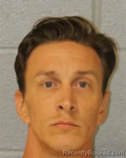 Mugshot of Tyler Christian Raper booked in Mecklenburg County, North Carolina on October 15, 2026