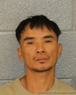 Mugshot of Siang Hmung booked in Mecklenburg County, North Carolina on October 18, 2026