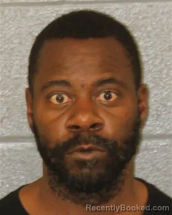 Mugshot of Mikal Atif Marsh booked in Mecklenburg County, North Carolina on October 21, 2026