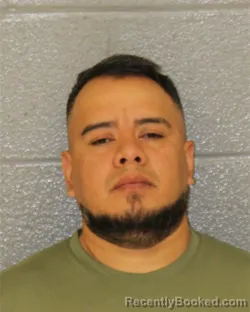 Mugshot of Alexis Geovanni Bobadilla booked in Mecklenburg County, North Carolina on October 26, 2026