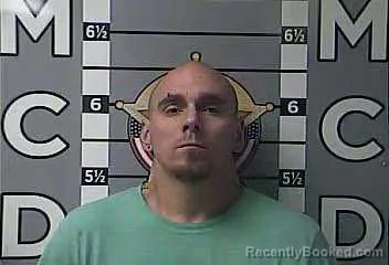 Mugshot of DANIEL MUTHIG booked in Madison County, Kentucky on July 14, 2026