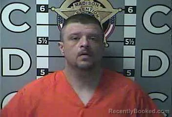 Mugshot of JUSTIN FOSTER booked in Madison County, Kentucky on July 6, 2026