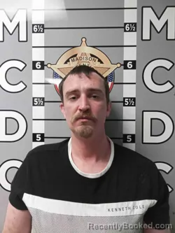 Mugshot of ZACHARY CRUTCHER