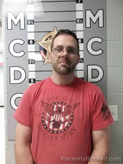 Mugshot of JUSTIN HAMILTON