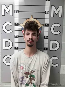 Mugshot of ETHAN MARCADA
