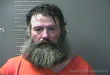 Mugshot of BURL JASON HOLLAND booked in Magoffin County, Kentucky on May 23, 2026