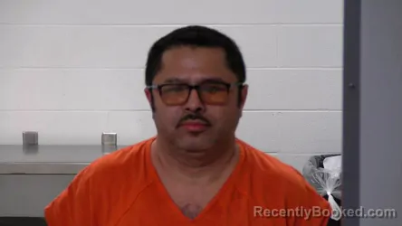 Mugshot of NESTOR NA HIPOLITO