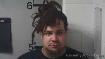 Mugshot of JORDAN M PLANCK