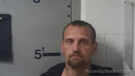 Mugshot of RUSSELL P MANEY