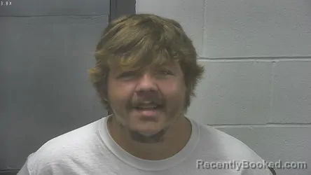 Mugshot of Austin Levi Trent booked in Meade County, Kentucky on August 6, 2026