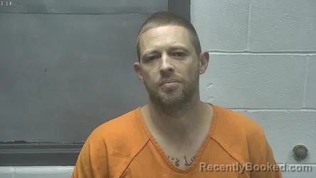 Mugshot of TRAVIS AMBROSE METTLING