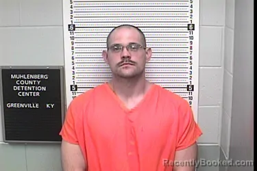 Mugshot of JOHNATHAN ISSAC HOLMAN booked in Muhlenberg County, Kentucky on March 18, 2026