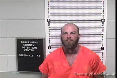 Mugshot of ZACHARY HUNTER SZELA booked in Muhlenberg County, Kentucky on April 22, 2026