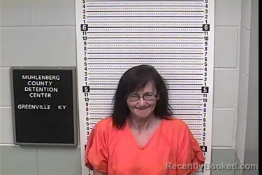 Mugshot of KELLY RENEE GIBSON booked in Muhlenberg County, Kentucky on July 9, 2026