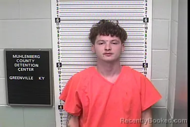 Mugshot of Aaron Gage Foster booked in Muhlenberg County, Kentucky on October 4, 2026