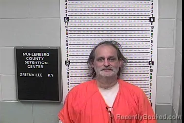 Mugshot of Kevin Neal Russell booked in Muhlenberg County, Kentucky on October 26, 2026