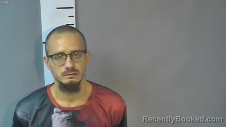 Mugshot of Dustin Lynn Rosario booked in Nelson County, Kentucky on October 6, 2026