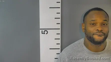 Mugshot of WILFRED LAMONT CUE