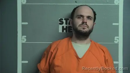 Mugshot of AUSTIN E MOORE