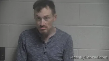 Mugshot of GEORGE JOHN CUMMING