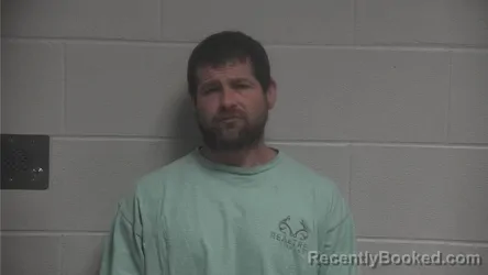 Mugshot of TREVOR LLOYD BUCKNER