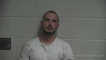 Mugshot of AUSTIN LAYNE BALLARD booked in Oldham County, Kentucky on April 1, 2026