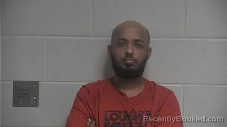 Mugshot of ADIRANMAN MOHAMED ABDULLE booked in Oldham County, Kentucky on April 6, 2026