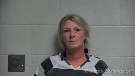 Mugshot of CRYSTAL COOPER booked in Oldham County, Kentucky on May 12, 2026