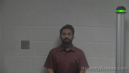 Mugshot of RAGHUVIR VAGHELA booked in Oldham County, Kentucky on June 26, 2026